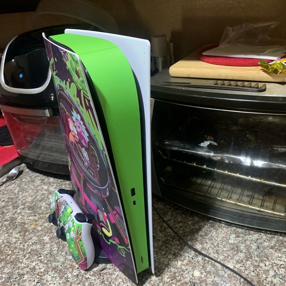 Comes with two controllers. Custom Rick and Morty skin on ps5. - Picture 3 of 5